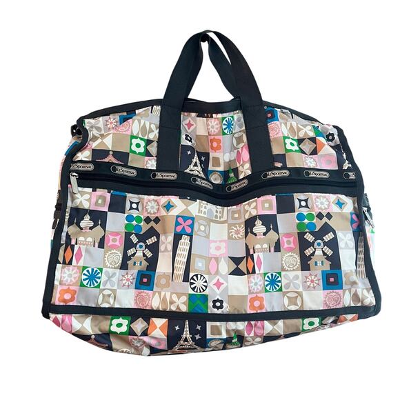 Lesportsac Handbags - LeSportsac Disney It's a Small World Boston Bag Around The World Multicolor